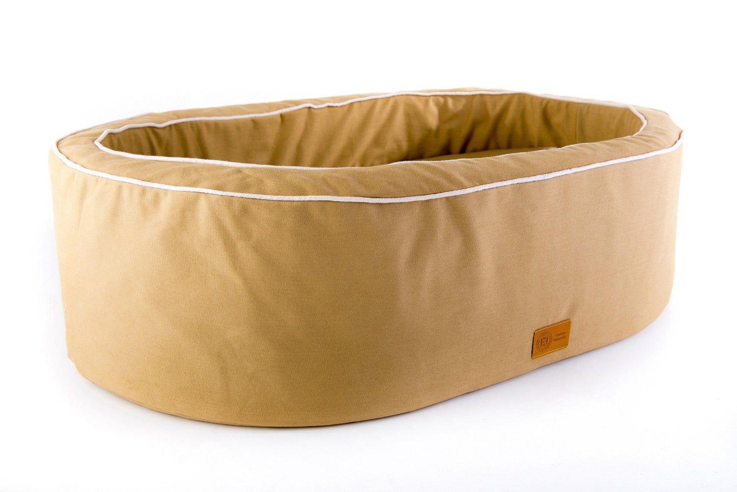 Sand and cream bull denim cotton natural Nest dog bed from organic British lambs wool and materials. Made in Britain.